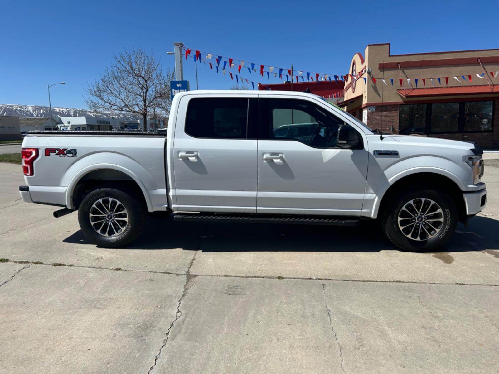 2019 White /BLACK Ford F-150 XLT SuperCrew 6.5-ft. Bed 4WD (1FTEW1E47KF) with an 3.5L V6 TURBO engine, 6A transmission, located at 3030 CY Ave, Casper, WY, 82604, (307) 265-3830, 42.827816, -106.357483 - Check out this beauty! It has the FX4 Off-Road Package, with remote start, and heated seats. Come see how to get into this truck, and be able to off-road with style! - Photo #4